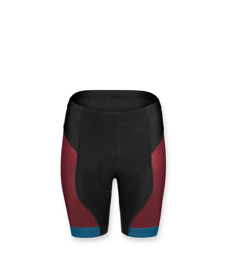 Un short de cyclisme pour femme de owayo en noir avec des panneaux latéraux rouges et une finition bleue au bas.