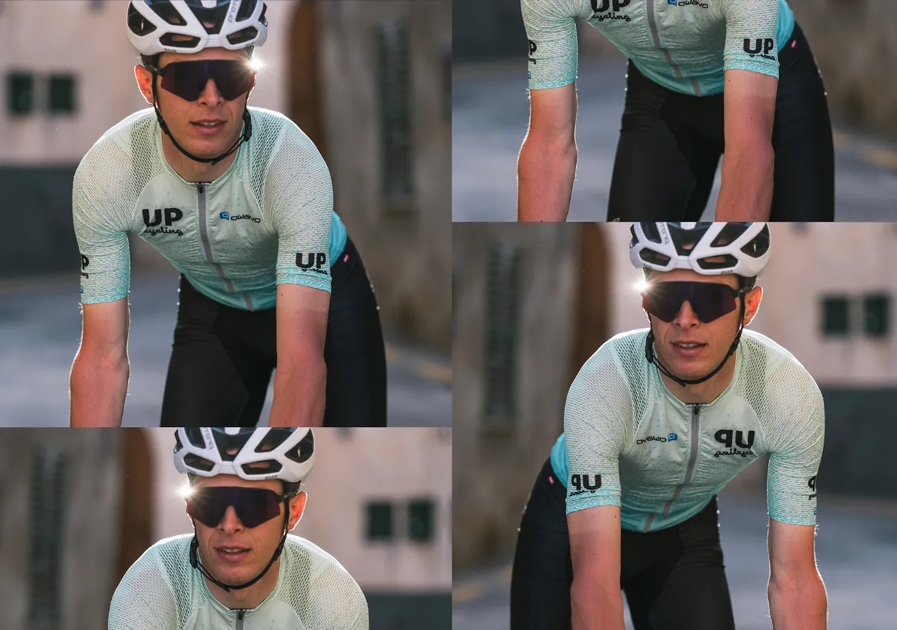 Un cycliste portant un maillot bleu clair à motifs avec le logo 'UP cycling' et le nom de marque 'owayo' sur la poitrine, en train de faire du vélo.